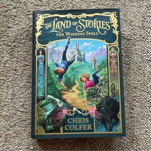 SIGNED COPY of The Land of Stories: the Wishing Spell by Chris Colfer